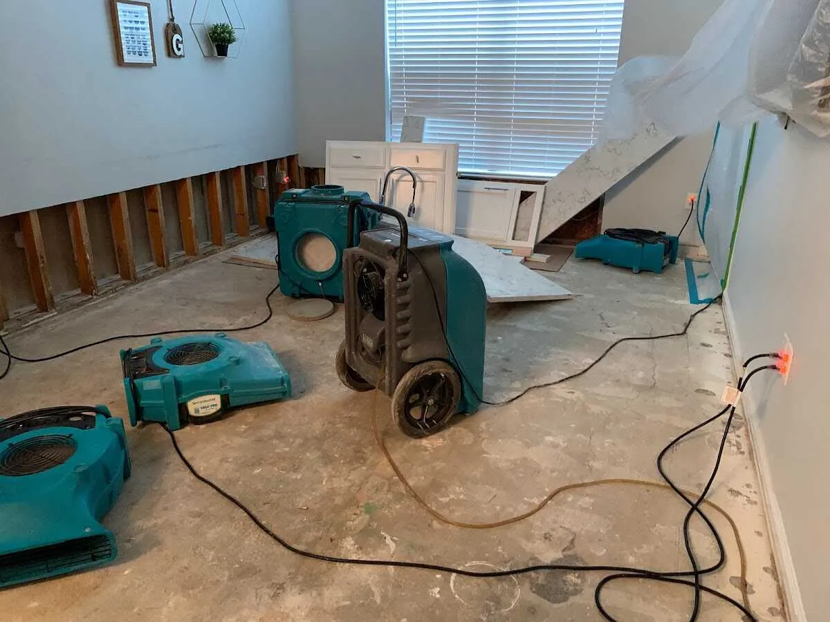 Dehumidifier in flood-cut room for Water Damage Restoration in Oradell